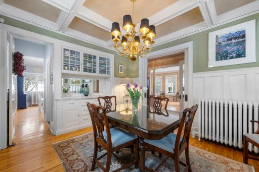 The view from the dining room to the living room and to the kitchen