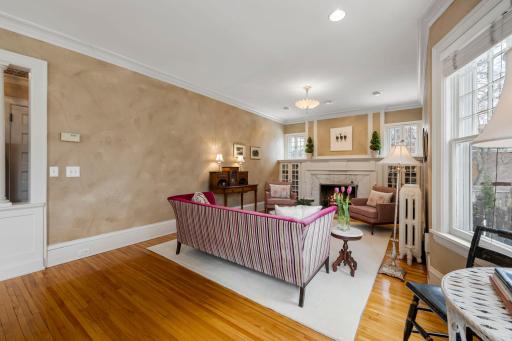 The living room has multiple seating areas