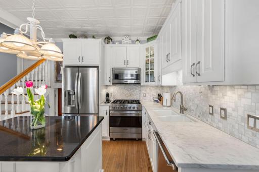 Stainless appliances and Carrera marble countertop