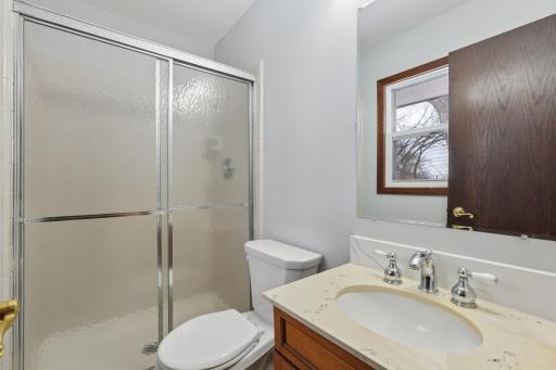 Master ensuite with new lighting, new shower head