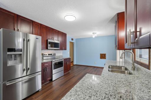 Brand new high end stainless steel appliances, granite countertops and subway tile backsplash