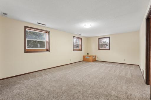 Large game room or play room with new carpet and fresh paint