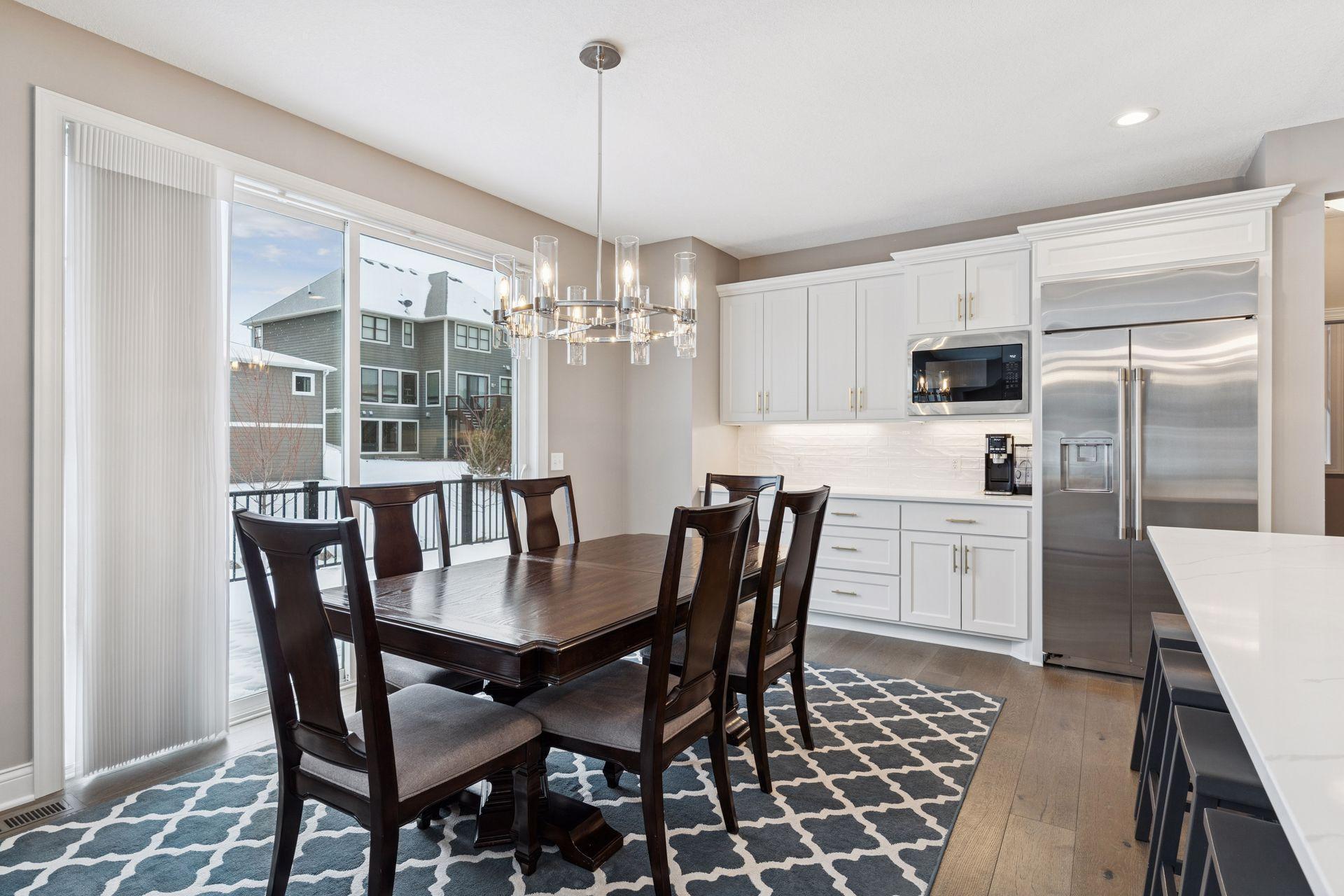 Big eating area in kitchen with walk-out to deck and yard!