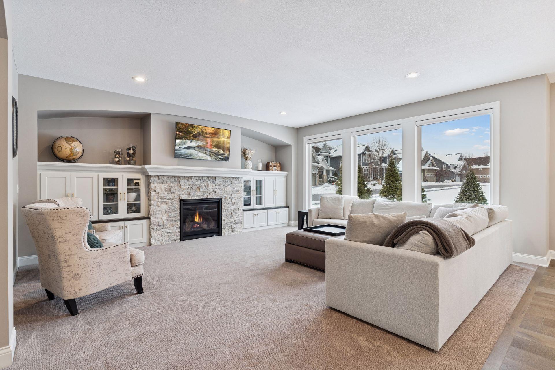 Main floor family room with stone fireplace and built-ins!