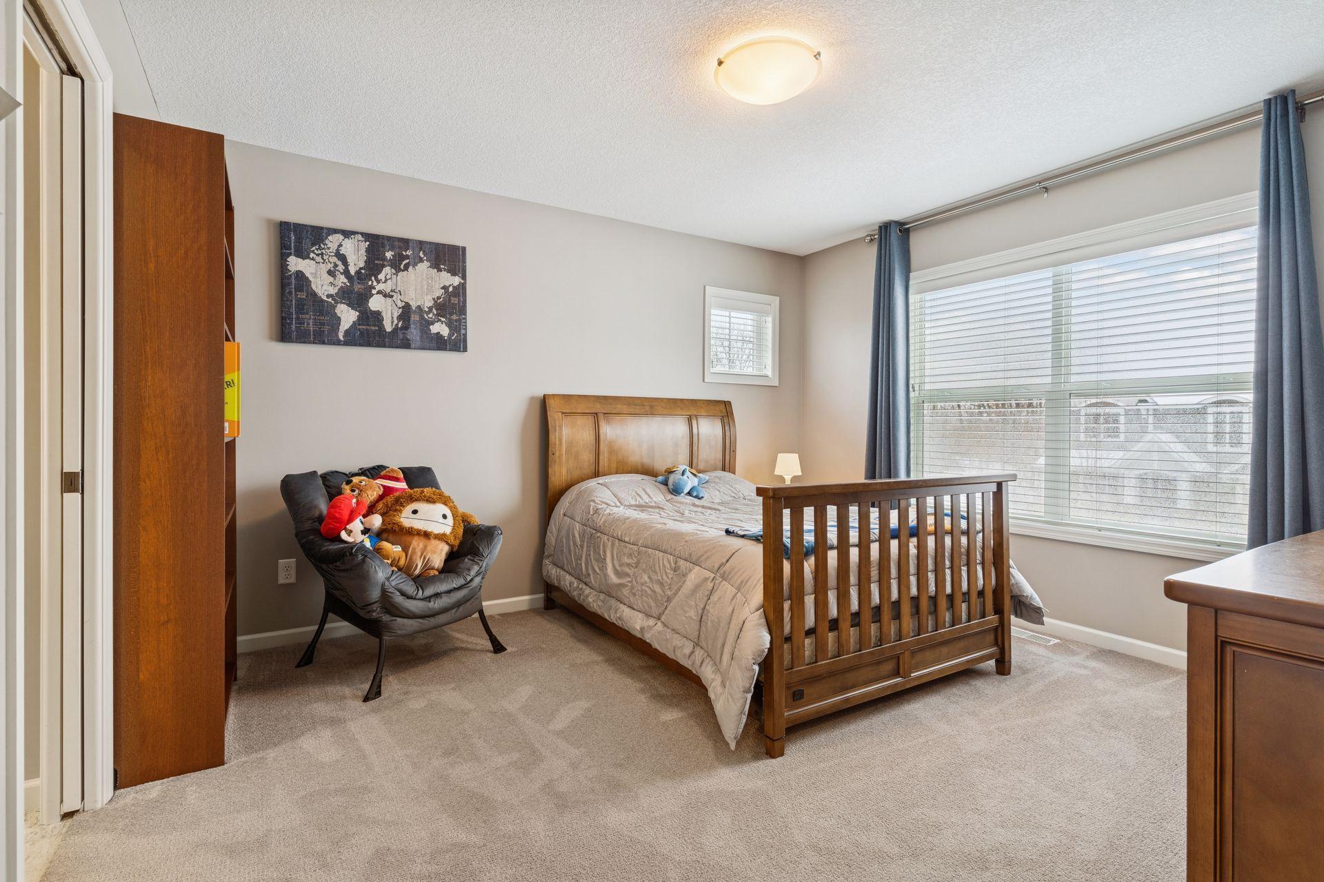 #4 of the 4 bedrooms on the upper level. This bedroom has private ensuite bath.