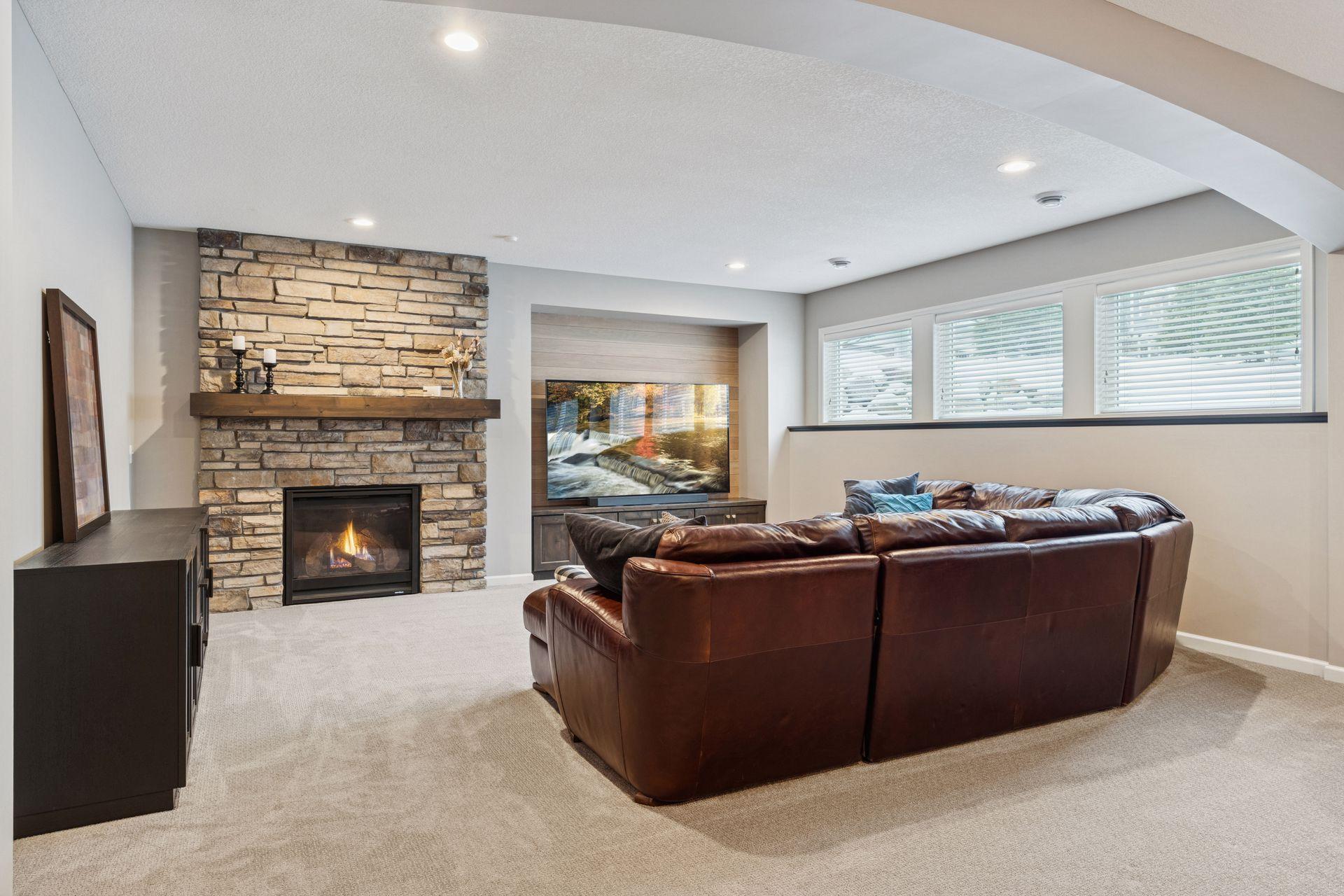 Fully finished lower level with gas fireplace in the family room, wet bar, 3/4 tile bath, home basketball court and workout room.