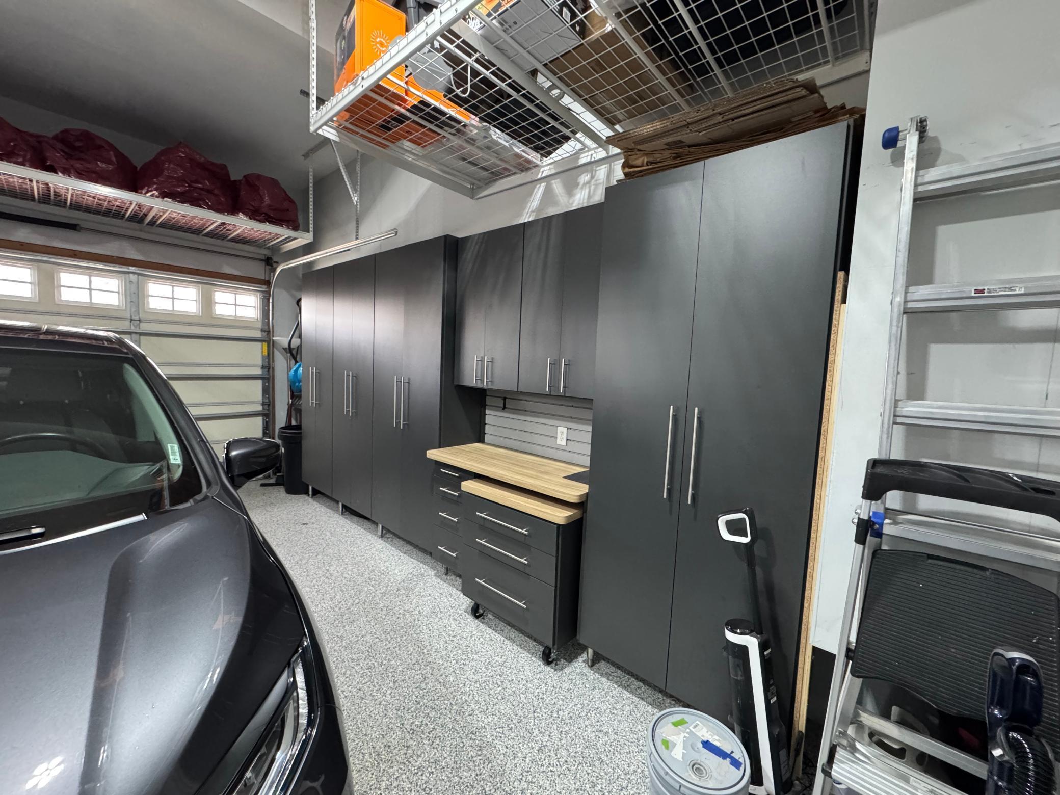 Do you love a well organized garage with storage and work bench!