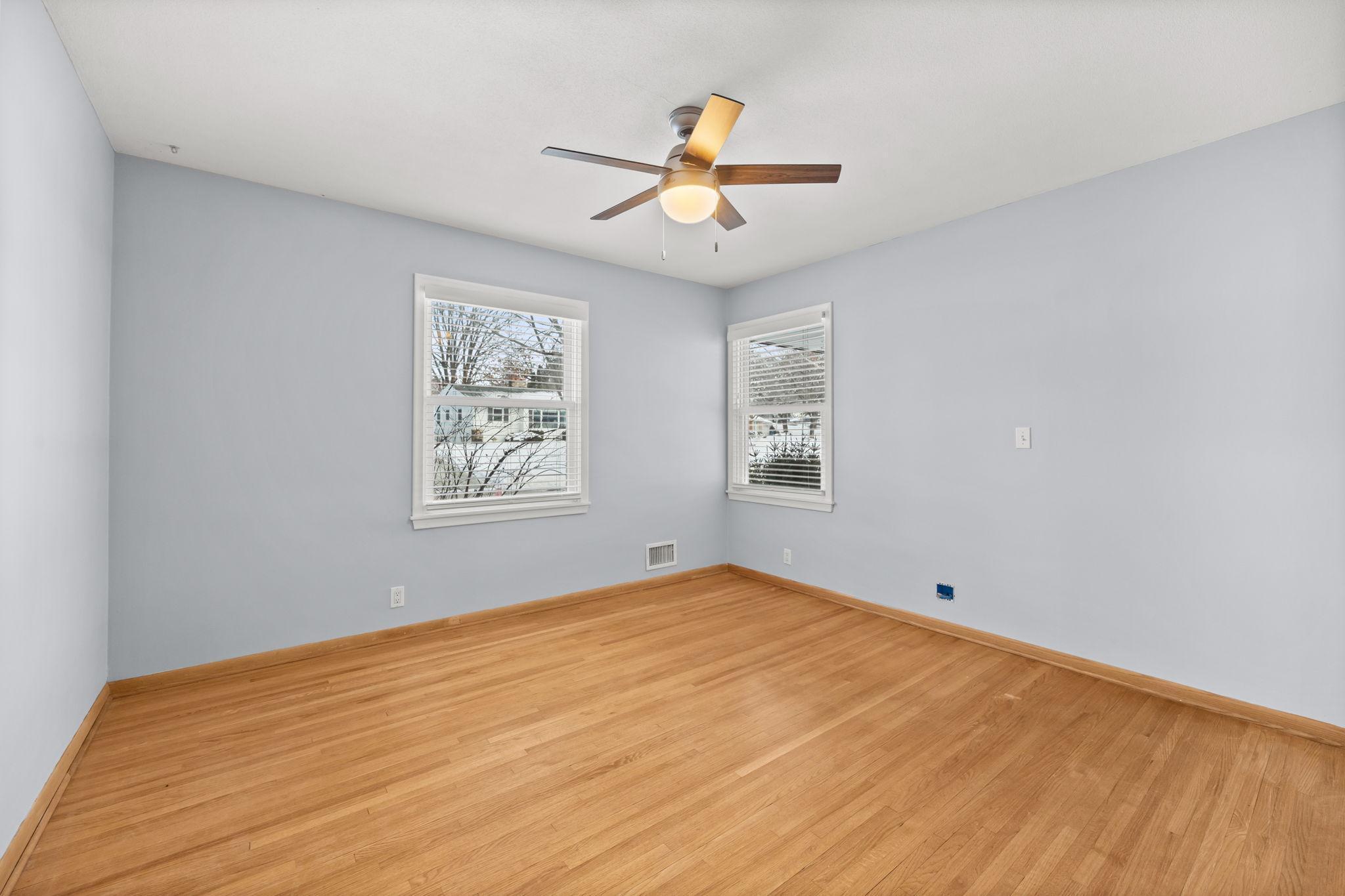 3rd bedroom on the main floor. Hardwood floors and fresh paint throughout.