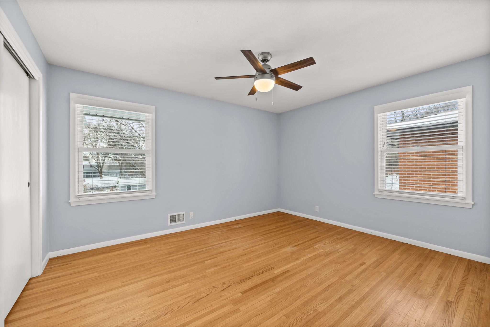 First bedroom on the main floor overlooking the backyard.