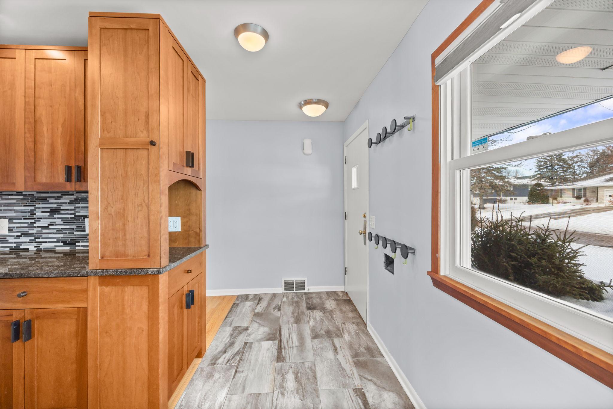 Convenient entryway / mudroom with ample storage.