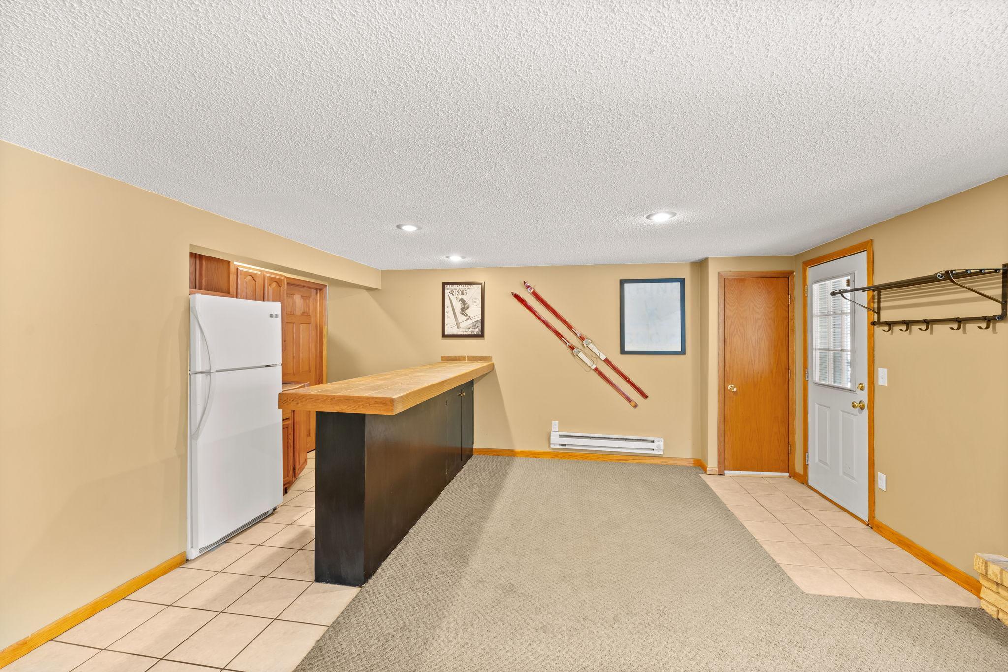 The walkout leads to the spacious paver patio.