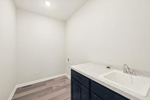 Fabulous show stopping floorplan, landscaping included. Community pool, clubhouse, miles of walking trails, parks, & Mississippi River down the street! This is a rare gem! Fall in love & call it HOME.