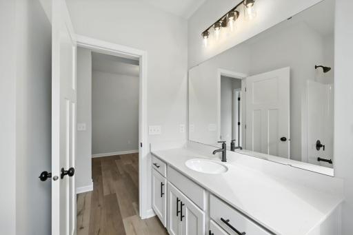 Fabulous show stopping floorplan, landscaping included. Community pool, clubhouse, miles of walking trails, parks, & Mississippi River down the street! This is a rare gem! Fall in love & call it HOME.