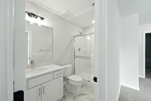 Fabulous show stopping floorplan, landscaping included. Community pool, clubhouse, miles of walking trails, parks, & Mississippi River down the street! This is a rare gem! Fall in love & call it HOME.