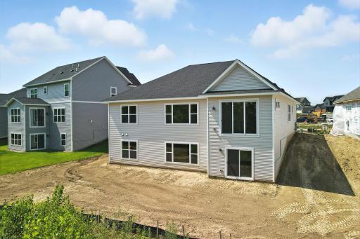 Fabulous show stopping floorplan, landscaping included. Community pool, clubhouse, miles of walking trails, parks, & Mississippi River down the street! This is a rare gem! Fall in love & call it HOME.