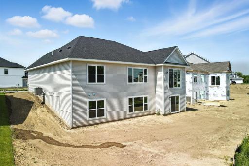 Fabulous show stopping floorplan, great backyard, Sod, landscaping included. Community pool, clubhouse, miles of walking trails, parks, & Mississippi River down the street! This is a rare gem! Fall in love & call it HOME.