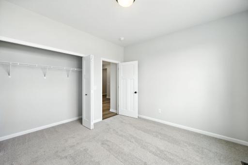 Fabulous show stopping floorplan, landscaping included. Community pool, clubhouse, miles of walking trails, parks, & Mississippi River down the street! This is a rare gem! Fall in love & call it HOME!!10+