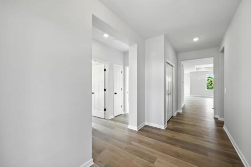 Fabulous show stopping floorplan, landscaping included. Community pool, clubhouse, miles of walking trails, parks, & Mississippi River down the street! This is a rare gem! Fall in love & call it HOME.