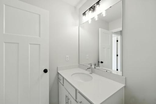 Fabulous show stopping floorplan, landscaping included. Community pool, clubhouse, miles of walking trails, parks, & Mississippi River down the street! This is a rare gem! Fall in love & call it HOME.