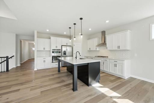 Fabulous show stopping floorplan,landscaping included. Community pool, clubhouse, miles of walking trails, parks, & Mississippi River down the street! This is a rare gem! Fall in love & call it HOME!!10+