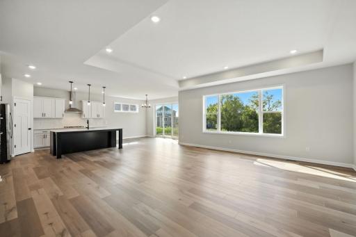 Fabulous show stopping floorplan, landscaping included. Community pool, clubhouse, miles of walking trails, parks, & Mississippi River down the street! This is a rare gem! Fall in love & call it HOME!!10+