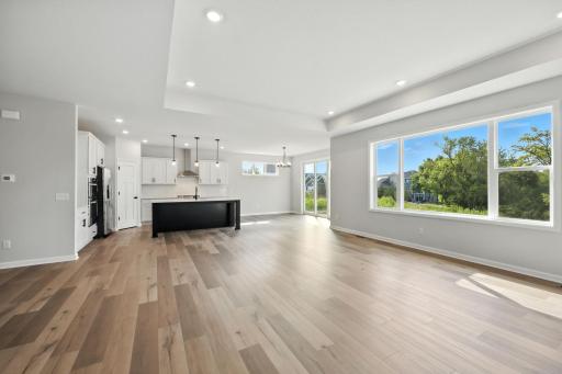 Fabulous show stopping floorplan, landscaping included. Community pool, clubhouse, miles of walking trails, parks, & Mississippi River down the street! This is a rare gem! Fall in love & call it HOME!!10+