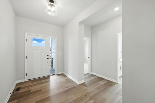 Fabulous show stopping floorplan, sod, landscaping included. Community pool, clubhouse, miles of walking trails, parks, & Mississippi River down the street! This is a rare gem! Fall in love & call it HOME!!10+