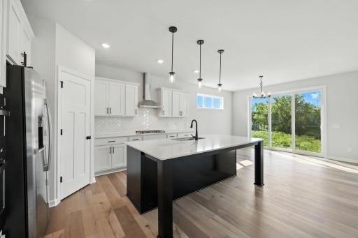 Fabulous show stopping floorplan, landscaping included. Community pool, clubhouse, miles of walking trails, parks, & Mississippi River down the street! This is a rare gem! Fall in love & call it HOME!!10+