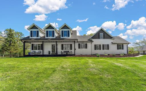 Peaceful front porch with great curb appeal to enjoy many seasons and wildlife!