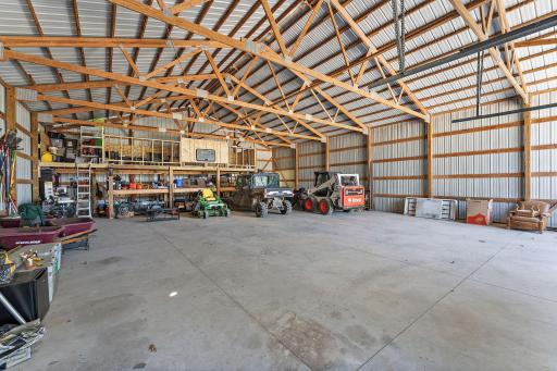 Outbuilding with full concrete pad and amazing for storage or having a great shop!