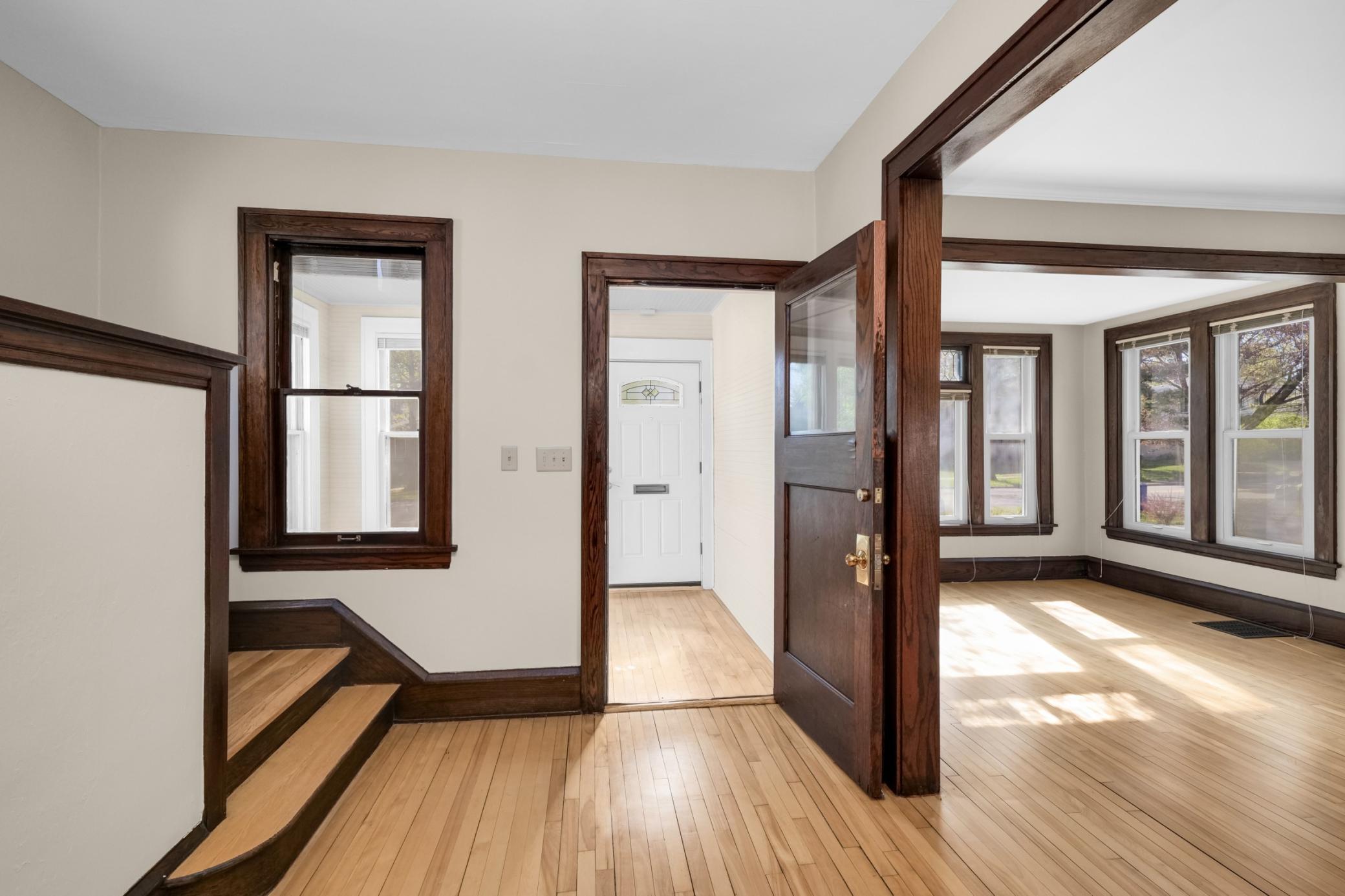 View of the front door and entry to the 3-season porch.