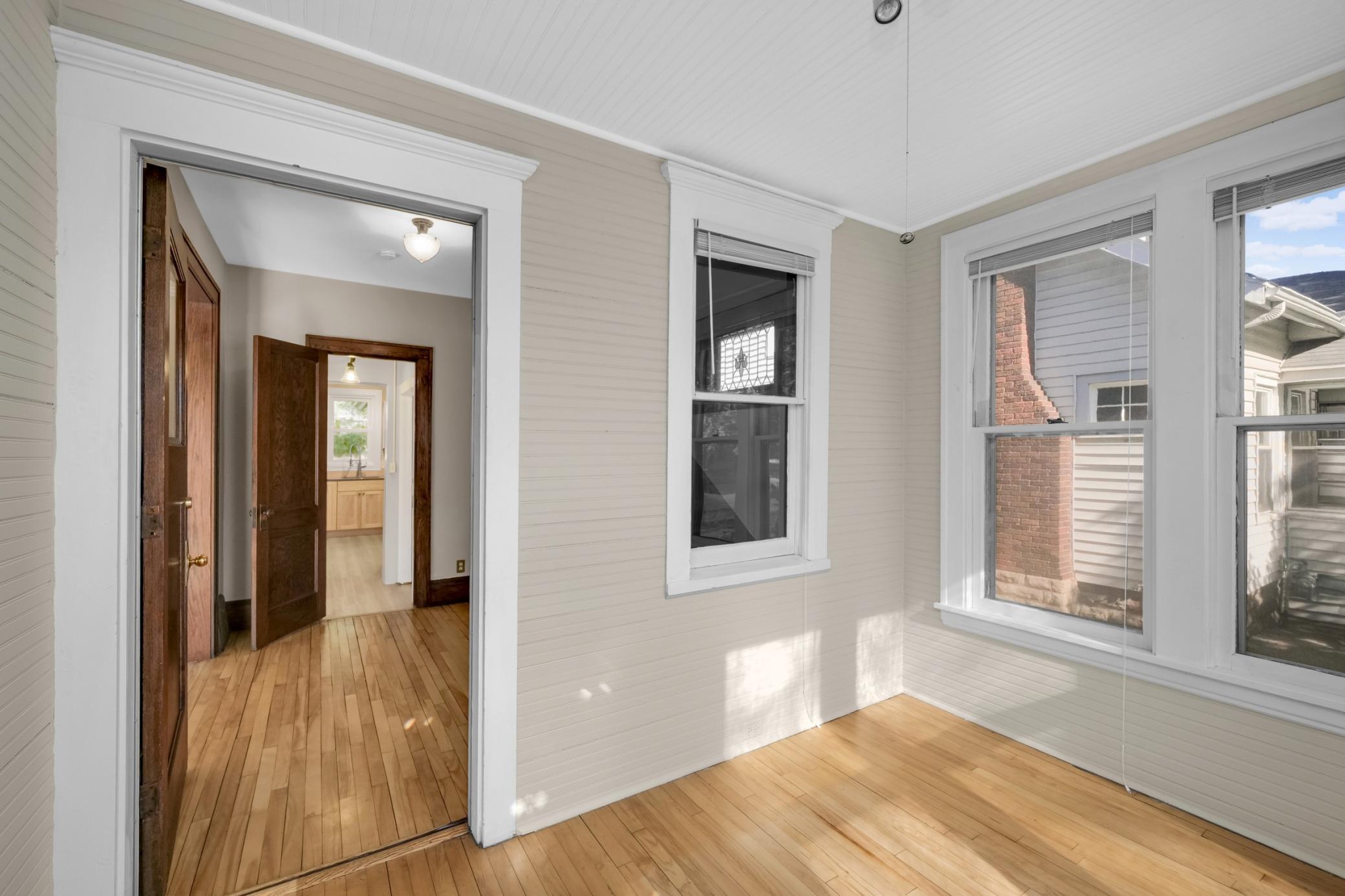 Another view of the 3 season porch and front foyer.