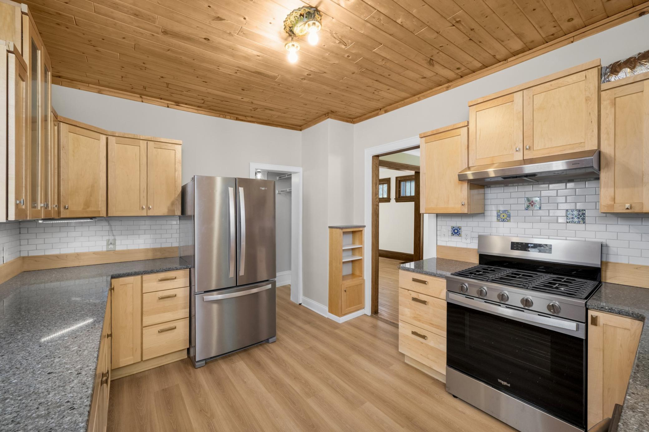 New LVP flooring and new kitchen base cabinets.