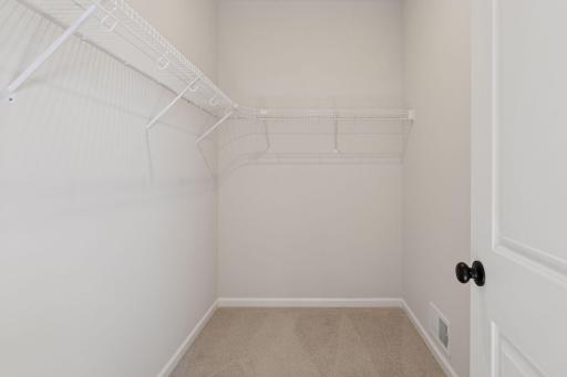 Photo is of a completed Carlton home with same selections and exterior. Some interior items may differ.