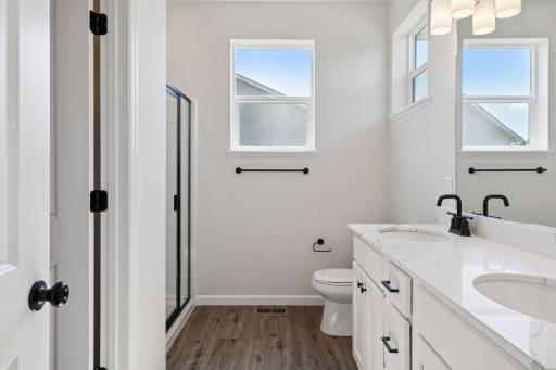 Photo is of a completed Carlton home with same selections and exterior. Some interior items may differ.