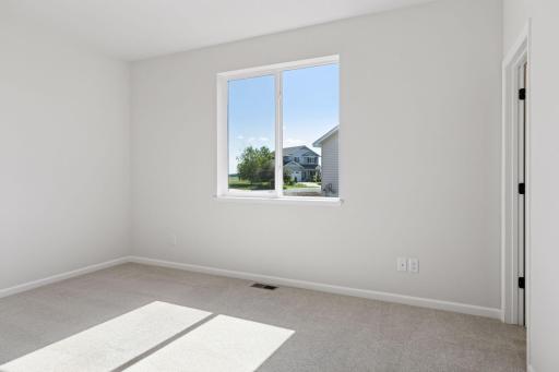 Photo is of a completed Carlton home with same selections and exterior. Some interior items may differ.
