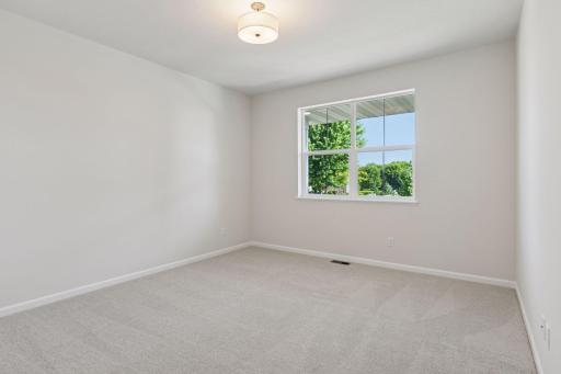 Photo is of a completed Carlton home with same selections and exterior. Some interior items may differ.