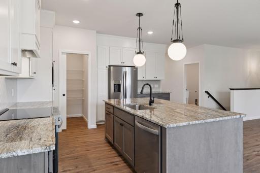 Photo is of a completed Carlton home with same selections and exterior. Some interior items may differ.
