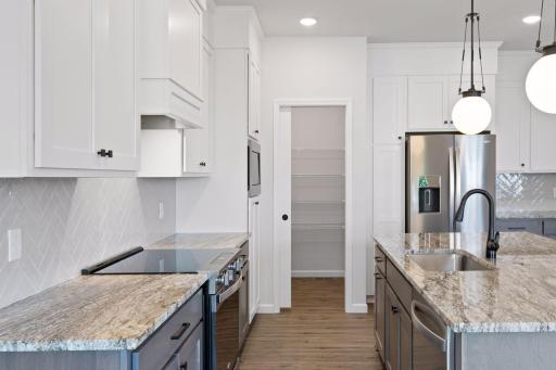 Photo is of a completed Carlton home with same selections and exterior. Some interior items may differ.
