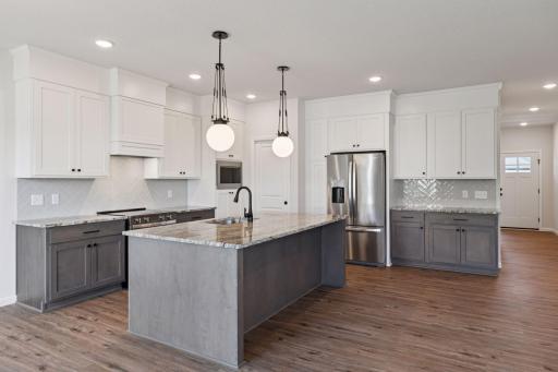 Photo is of a completed Carlton home with same selections and exterior. Some interior items may differ.