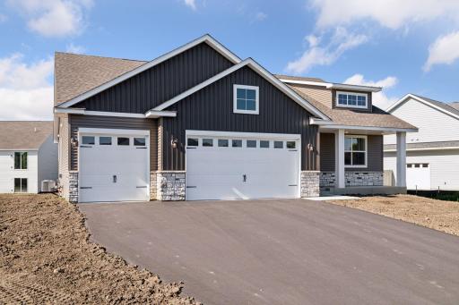 Photo is of a completed Carlton home with same selections and exterior. Some interior items may differ.