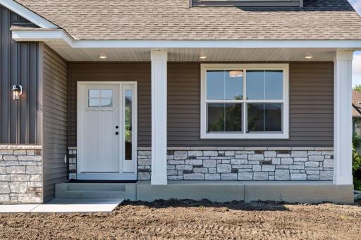 Photo is of a completed Carlton home with same selections and exterior. Some interior items may differ.