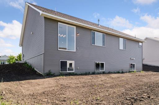 Photo is of a completed Carlton home with same selections and exterior. Some interior items may differ.