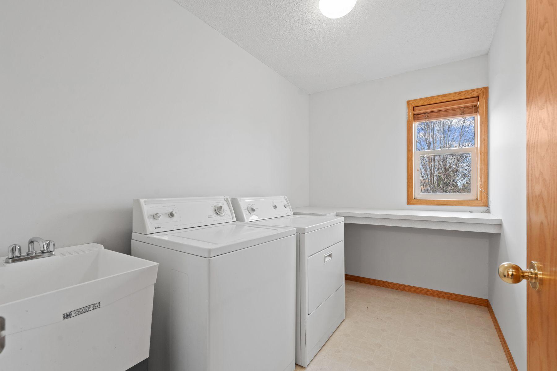spacious and functional upper level laundry room