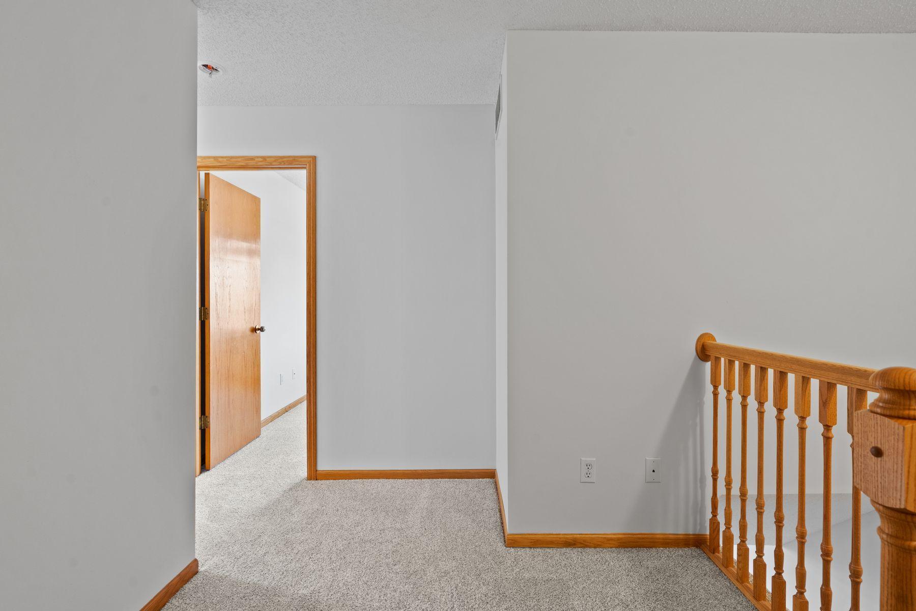 Upper level hallway. New carpet throughout