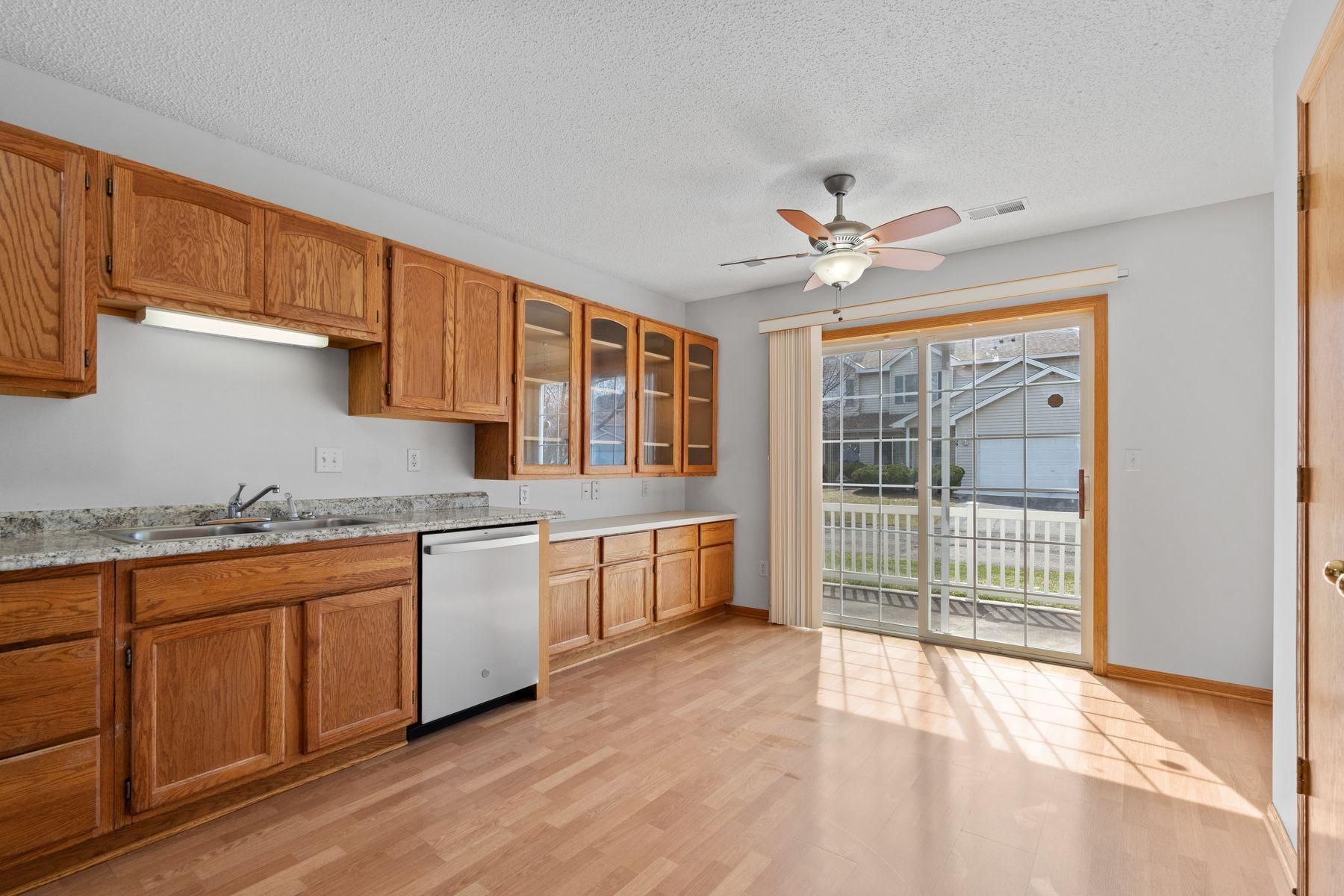 Large open kitchen with walkout to patio