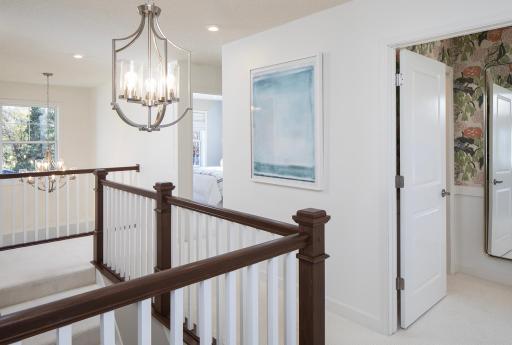 An open upstairs hallway brings everything together with a layout that feels easy, connected and effortless *photo of model home (design options may vary)