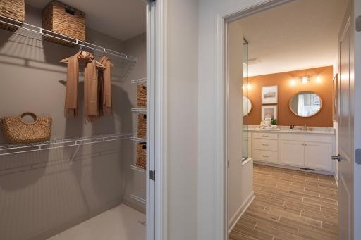Closet to bath in one easy flow - this setup keeps mornings moving and everything right where you want it *photo of model home (design options may vary)