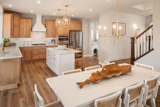 Where diners turn into stories - open to the kitchen so everything flows and no one misses a moment *photo of model home (design options may vary)