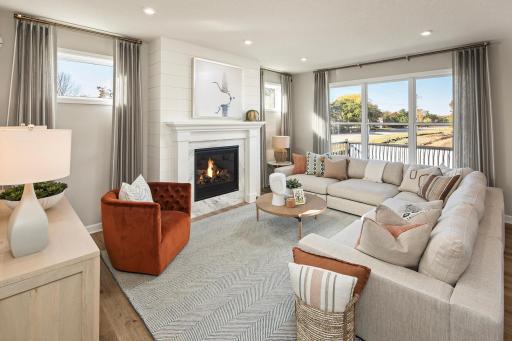 Sink into comfort - sunlight, soft textures, and easy flow make this a favorite spot *photo of model home (design options may vary)